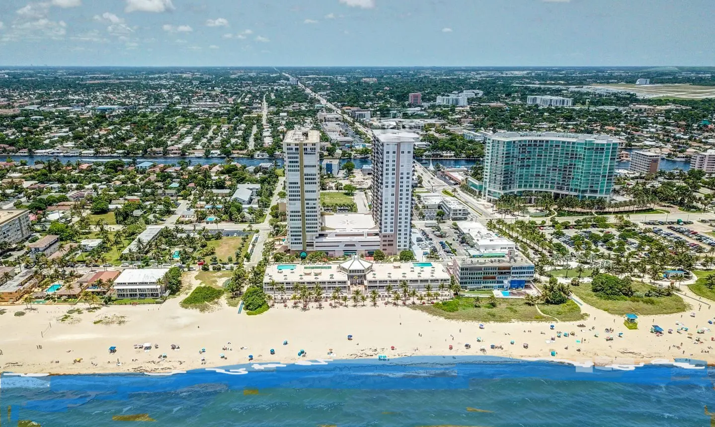 BEACH North Tower 5 A view of the beach and buildings from above.